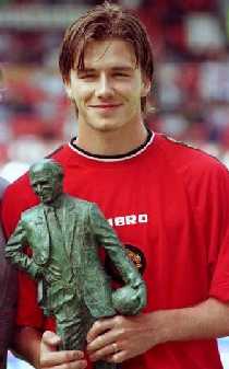 David Beckhma holds the Sir Matt player of the year award